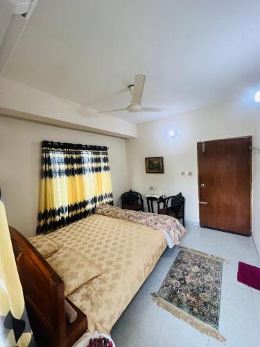 Cama o camas de una habitación en Gulshan Guest House