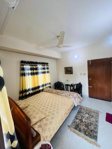 Cama o camas de una habitación en Gulshan Guest House
