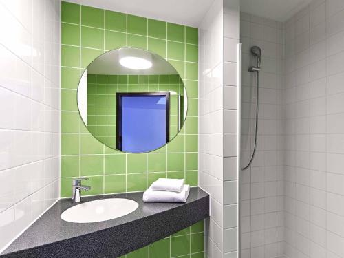 Un baño de B&B Hotel Osnabrück