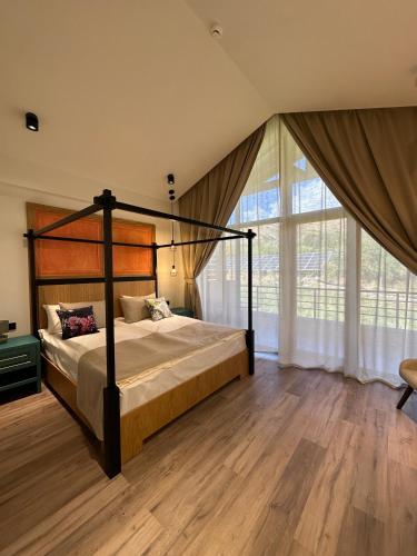 Postelja oz. postelje v sobi nastanitve Sona Boutique Resort