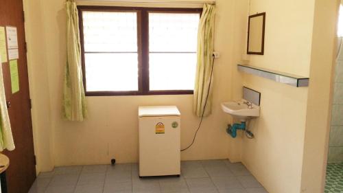 Et badeværelse på Happy Bungalow