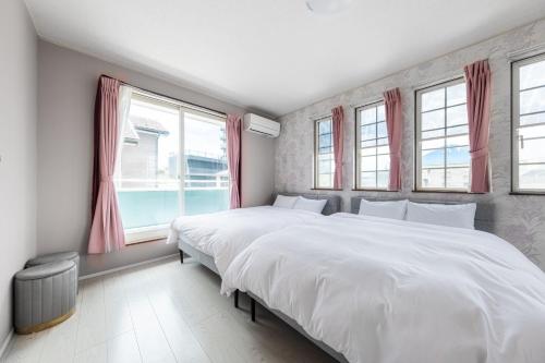 Кровать или кровати в номере Casa Blue Gotenba - Vacation STAY 31498v