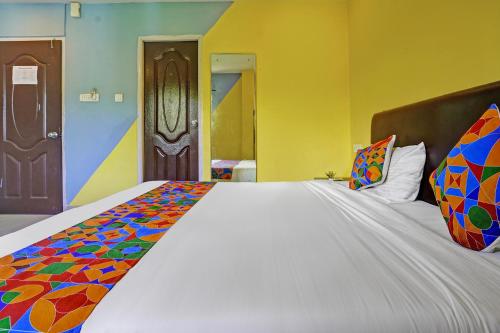Postel nebo postele na pokoji v ubytování FabHotel 29 Beach House