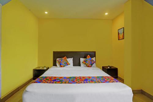 Postel nebo postele na pokoji v ubytování FabHotel 29 Beach House