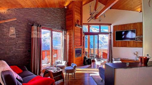 0med Spacieux appartement Les Menuires skis aux pieds