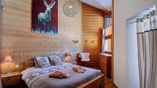 0med Spacieux appartement Les Menuires skis aux pieds