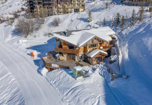 0med Spacieux appartement Les Menuires skis aux pieds