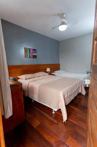 a bedroom with a bed in a room at Pousada do Chafariz in Mariana