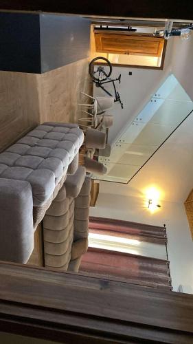 a room with a staircase with a pile of towels at Villa oasis, Résidence Nianing in Nianing