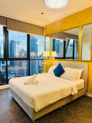 Postel nebo postele na pokoji v ubytování Scarletz Purple Suites KLCC