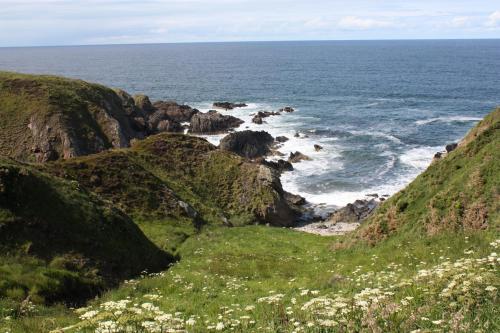 a view of the ocean from the cliffs at Station Hotel Portsoy in Portsoy