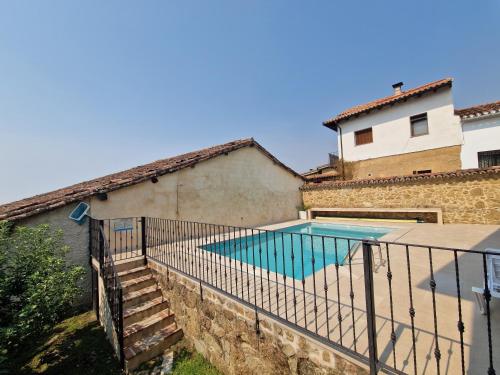 a swimming pool in the backyard of a house at "La Casa del Pueblo" - La Vera - AT-CC-00451 in Viandar de la Vera