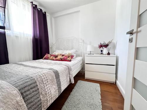 En eller flere senge i et værelse på CENTRUM Marszalkowska APPART Parking