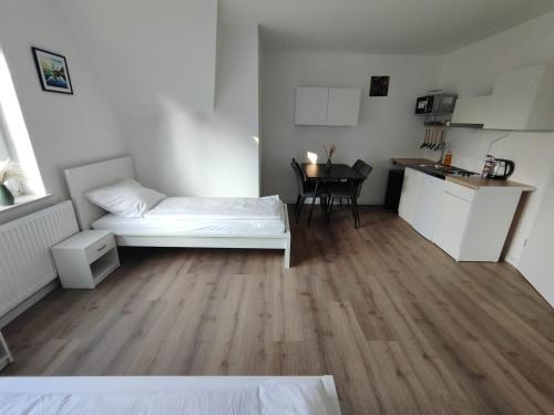 Η κουζίνα ή μικρή κουζίνα στο ACR-Accommodations, Gästezimmer, Monteurunterkünfte