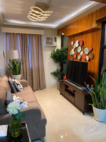 Zona de estar de Executive Suite Condo 1