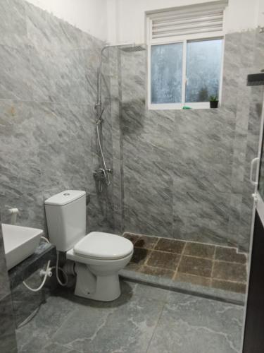 Ein Badezimmer in der Unterkunft Minu Homestay & Villa