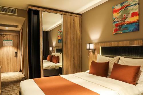 Katil atau katil-katil dalam bilik di Continent Hotel Kahramanmaraş