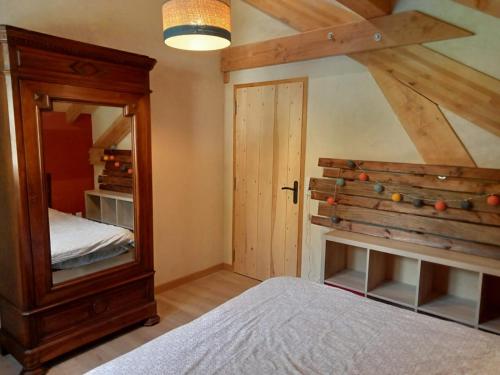 Ένα ή περισσότερα κρεβάτια σε δωμάτιο στο Chalet les couleurs