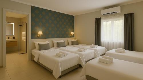 Postel nebo postele na pokoji v ubytování Çorlu Safir Hotel & City Center