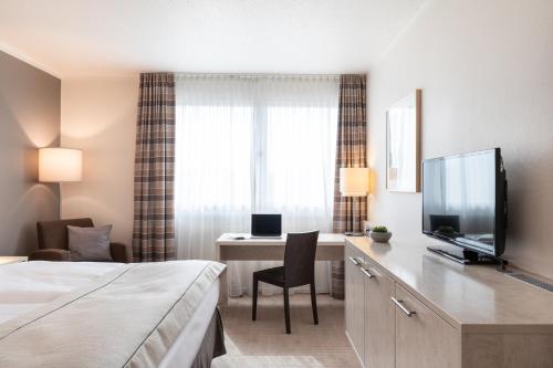 Μια τηλεόραση ή/και κέντρο ψυχαγωγίας στο Garner Hotel Mainz by IHG