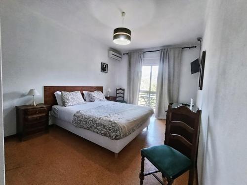 Ένα ή περισσότερα κρεβάτια σε δωμάτιο στο Residencial Do Rita em Rio Caldo