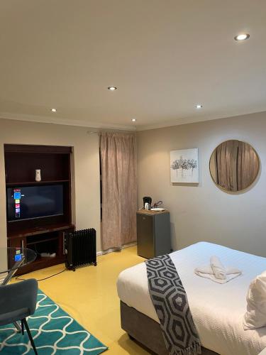 Ένα ή περισσότερα κρεβάτια σε δωμάτιο στο Nala Guest House