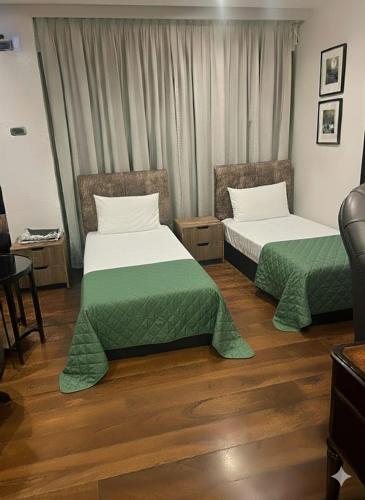A bed or beds in a room at Moison Penthouse