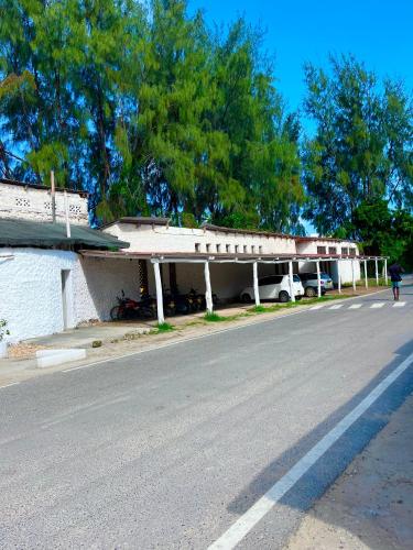 a building that is on the side of a road at Studio Cecile in Malindi