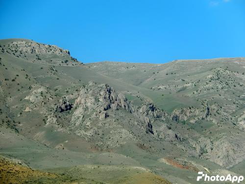 a rocky mountain with a blue sky in the background at Veni Vedi in Vedi