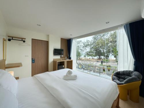 Ένα ή περισσότερα κρεβάτια σε δωμάτιο στο Fishtail Hostel Phuket