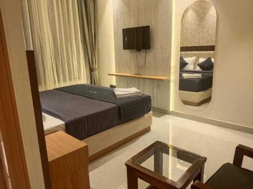 Postel nebo postele na pokoji v ubytování Hotel Imperia Grand