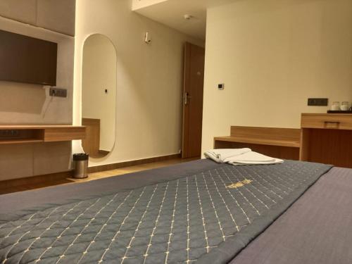 Postel nebo postele na pokoji v ubytování Hotel Imperia Grand