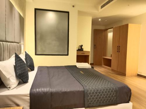 Postel nebo postele na pokoji v ubytování Hotel Imperia Grand