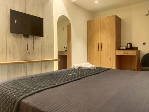 TV a/nebo společenská místnost v ubytování Hotel Imperia Grand