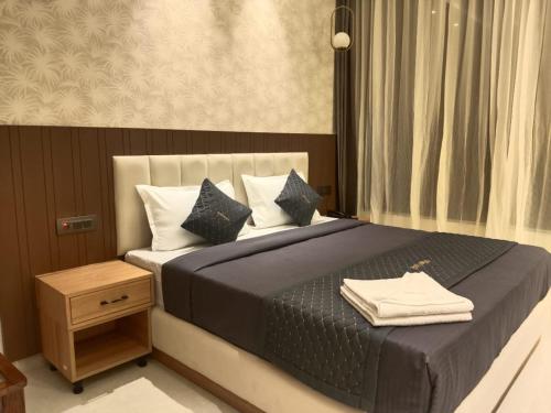 Postel nebo postele na pokoji v ubytování Hotel Imperia Grand