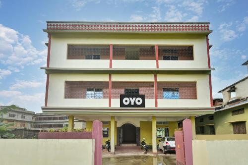 a large building with the word ox on it at Hotel O Homely Residency in Guwahati