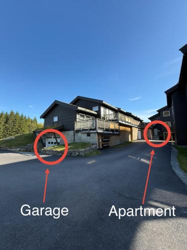 a view of a house and a road with red circles at Nice apartment on Geilotunet, Close to city center in Geilo