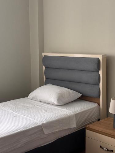 Postel nebo postele na pokoji v ubytování Kobuleti Garden Inn