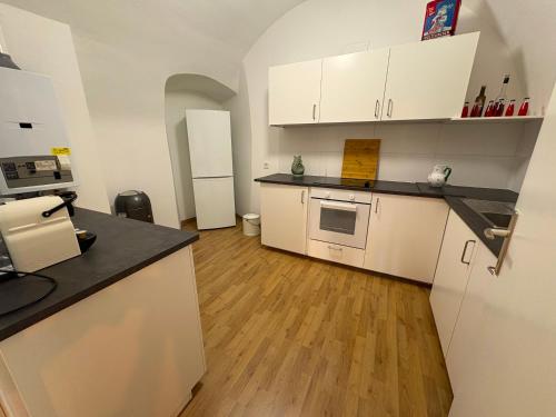 Kuchyň nebo kuchyňský kout v ubytování Traumhafter Altbau am See