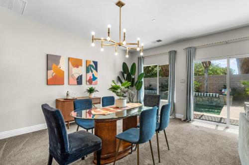 a dining room with a table and chairs at Mt San Jacinto View Home in Palm Springs