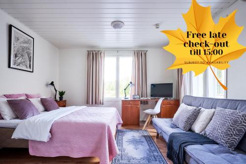 Ένα ή περισσότερα κρεβάτια σε δωμάτιο στο Hotel Villa Molnby