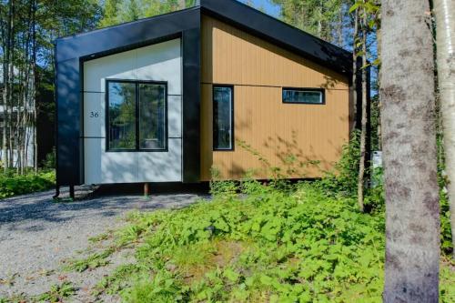 una rappresentazione di una casetta nel bosco di Chalet Le Baikal a Pont-Rouge