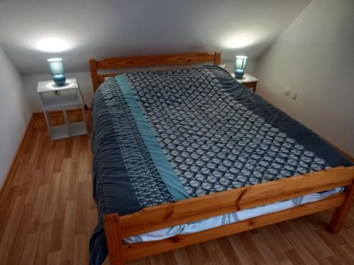 Postel nebo postele na pokoji v ubytování Gites rivière et colline