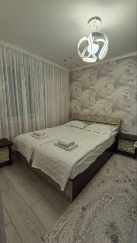 Ένα ή περισσότερα κρεβάτια σε δωμάτιο στο Guest House "Midnight"
