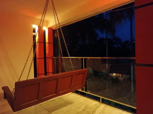 En balkon eller terrasse på CRS RED & WHITE HOMESTAY