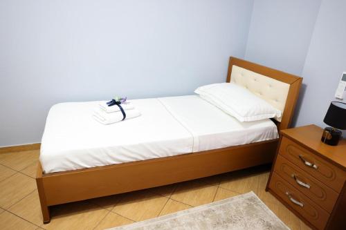 Ένα ή περισσότερα κρεβάτια σε δωμάτιο στο Anna-Perla Apartment