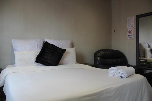 Ένα ή περισσότερα κρεβάτια σε δωμάτιο στο Newlands Comfortable Abode
