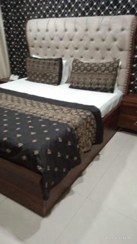 Cama o camas de una habitación en Sunrise Palace Guest House