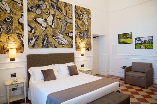 Ένα ή περισσότερα κρεβάτια σε δωμάτιο στο Casa Isabella Exclusive Hotel