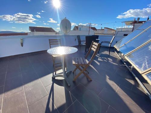 Rõdu või terrass majutusasutuses Merlyn